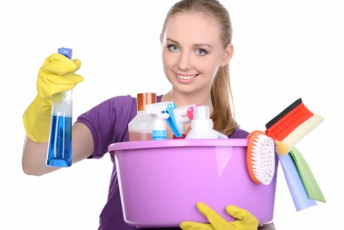 Technician handling carpet cleaning equipment during a controlled risk assessment